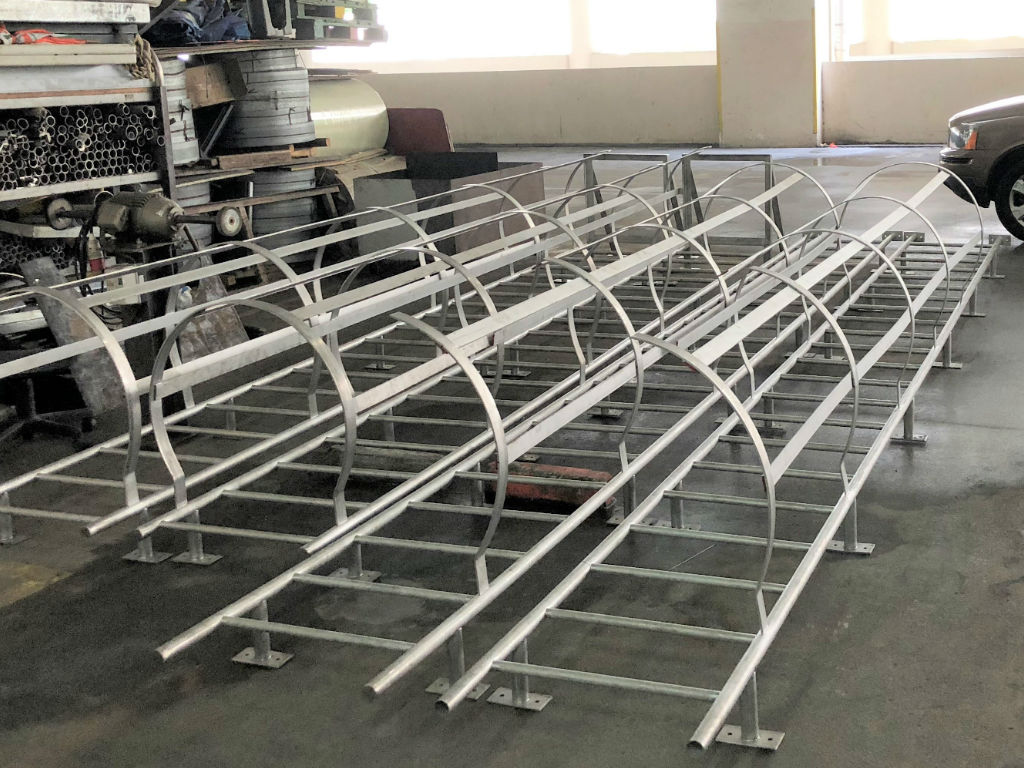 Superior manufacturer in Singapore showing neatly arranged and ready to use cat ladder with cage