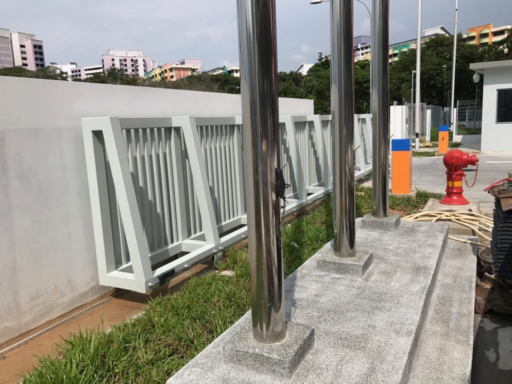 Hi-tech stainless steel flag pole installation in Singapore